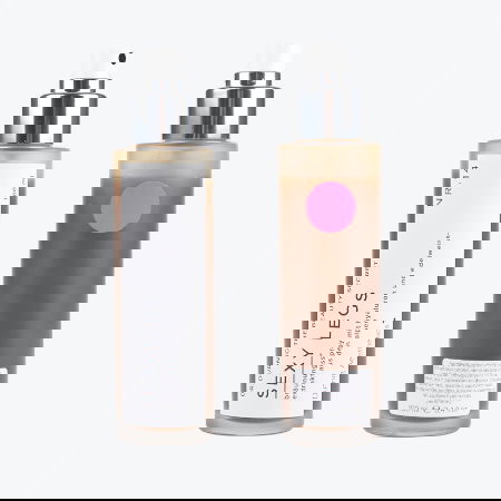 Ein Sexy Skin Spray Nr. 14 mit einer rosa Flasche auf weißem Hintergrund.